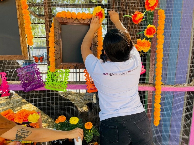 Woman decorating her booth