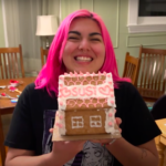 Participant with ginger bread house with "SUSI" written across the roof.